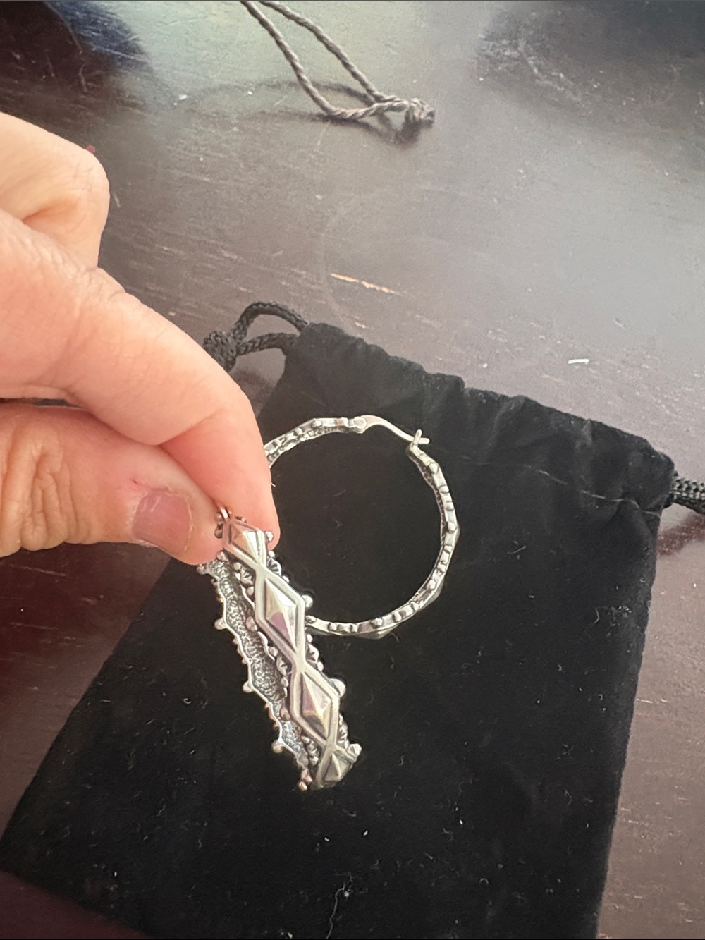 Intricate sterling silver hoops